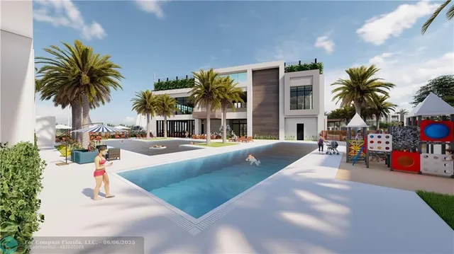 a swimming pool with outdoor seating and a potted plants