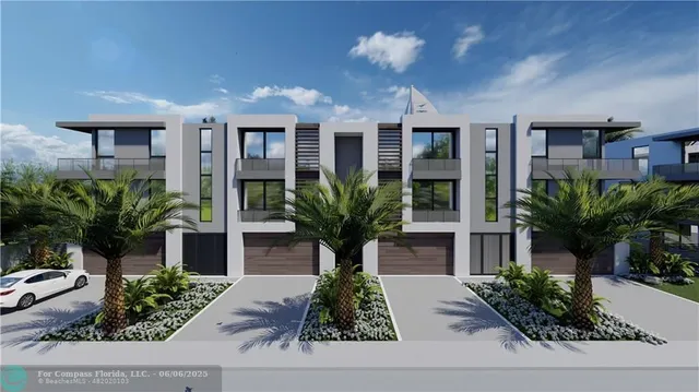 a view of a house with potted plants