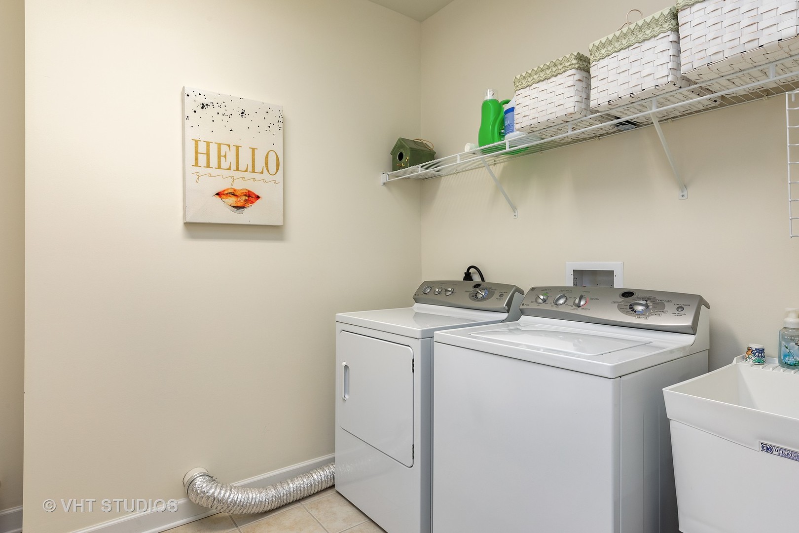 151 West Wing Street, Unit 506 Arlington Heights, IL 60005 - Photo 13 of 13 a utility room with dryer and washer