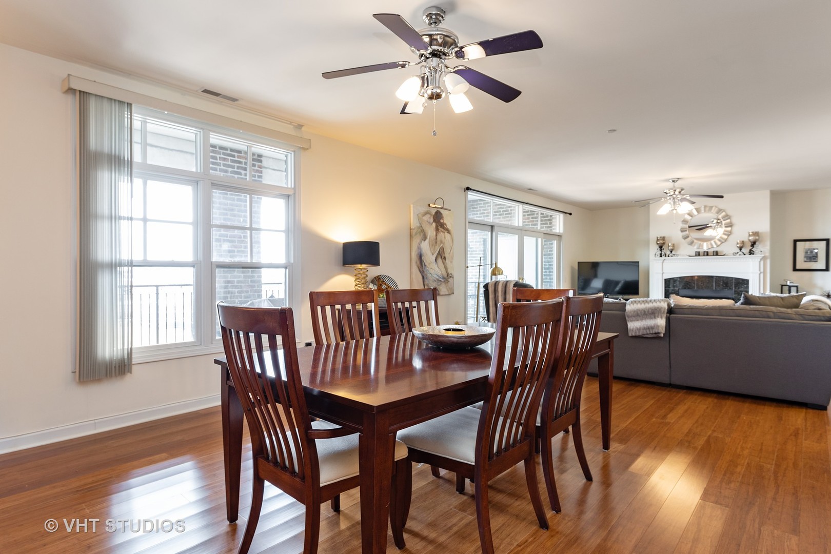 151 West Wing Street, Unit 506 Arlington Heights, IL 60005 - Photo 6 of 13 a view of a dining room with furniture window and wooden floor