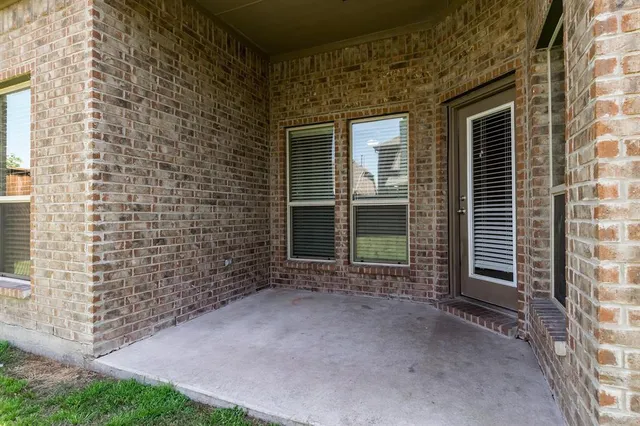 a view of outdoor space and front view of a house