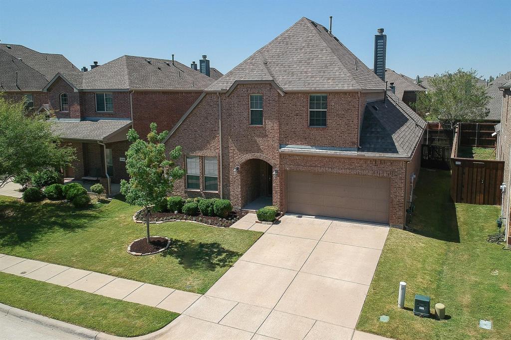 10104 Waterstone Way McKinney, TX 75072 - Photo 20 of 29 a front view of a house with a yard