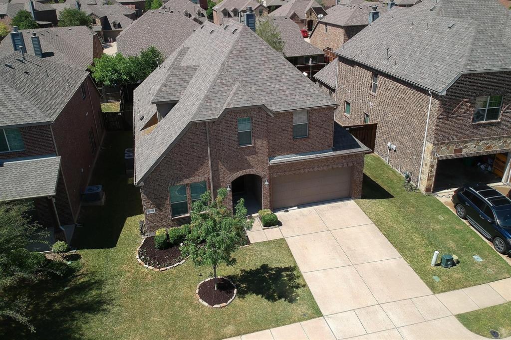 10104 Waterstone Way McKinney, TX 75072 - Photo 22 of 29 an aerial view of a house with a yard