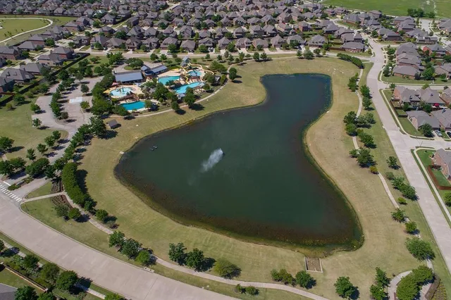 an aerial view of a pool