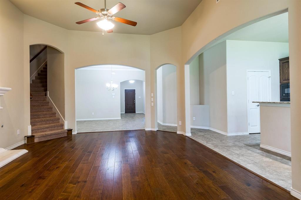 10104 Waterstone Way McKinney, TX 75072 - Photo 7 of 29 a view of a hallway with wooden floor