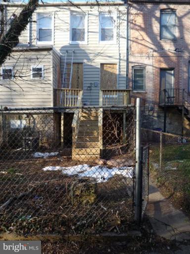 3905 Bonner Road Baltimore, MD 21216 - Photo 17 of 17 a view of a house with a yard