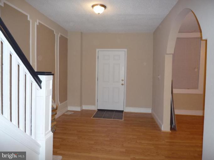 3905 Bonner Road Baltimore, MD 21216 - Photo 6 of 17 a view of entryway with wooden floor