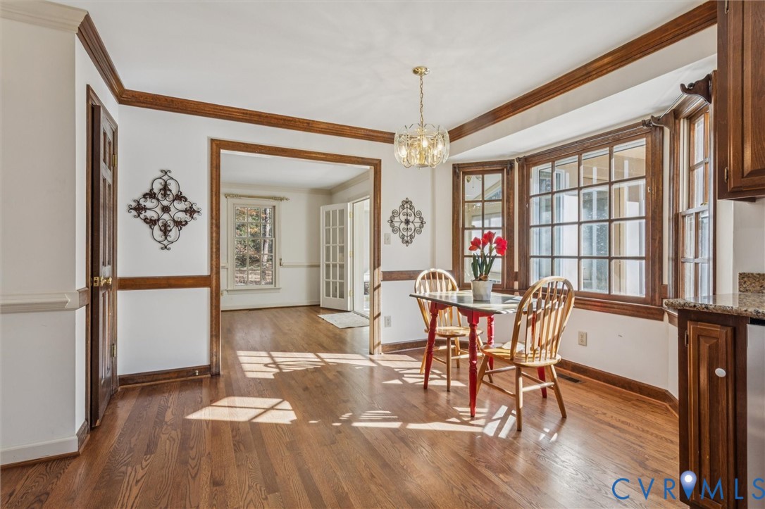 82 Governor Berkeley Road Williamsburg, VA 23185 - Photo 13 of 50 a view of a dining room with furniture window and wooden floor