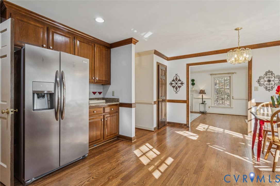 82 Governor Berkeley Road Williamsburg, VA 23185 - Photo 14 of 50 a kitchen with stainless steel appliances granite countertop a refrigerator and a sink
