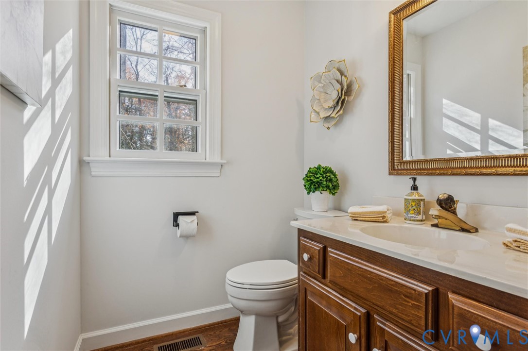 82 Governor Berkeley Road Williamsburg, VA 23185 - Photo 24 of 50 a bathroom with a sink a toilet and a mirror
