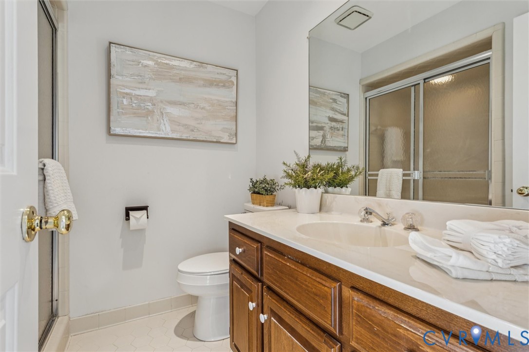 82 Governor Berkeley Road Williamsburg, VA 23185 - Photo 29 of 50 a bathroom with a sink a toilet and shower