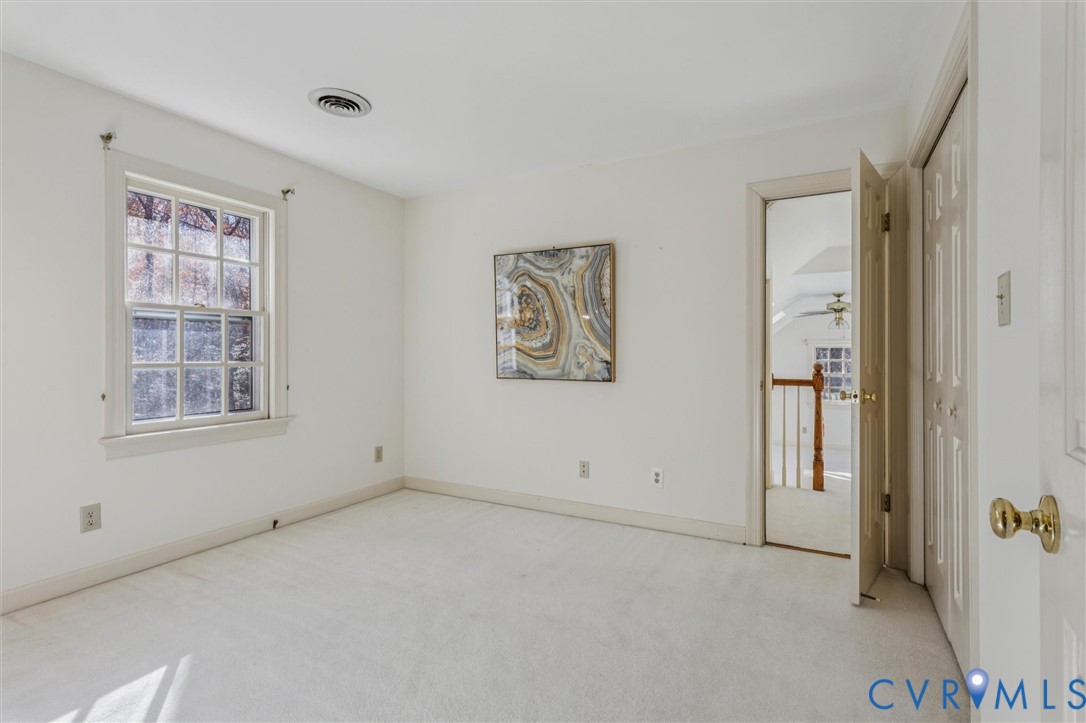 82 Governor Berkeley Road Williamsburg, VA 23185 - Photo 33 of 50 an empty room with windows