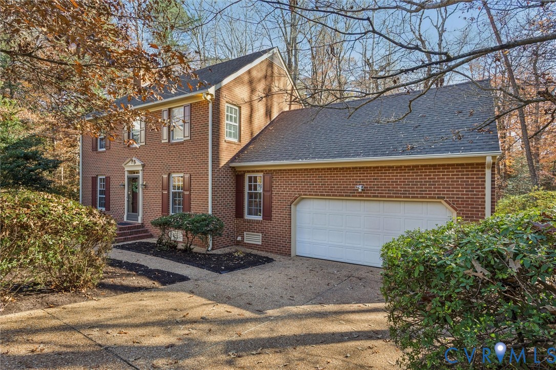 82 Governor Berkeley Road Williamsburg, VA 23185 - Photo 42 of 50 a front view of a house with garden