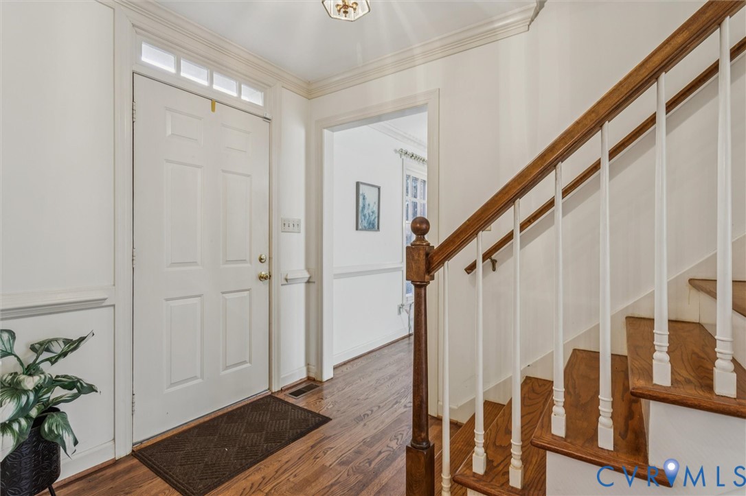 82 Governor Berkeley Road Williamsburg, VA 23185 - Photo 5 of 50 a view of entryway with wooden floor and stairs