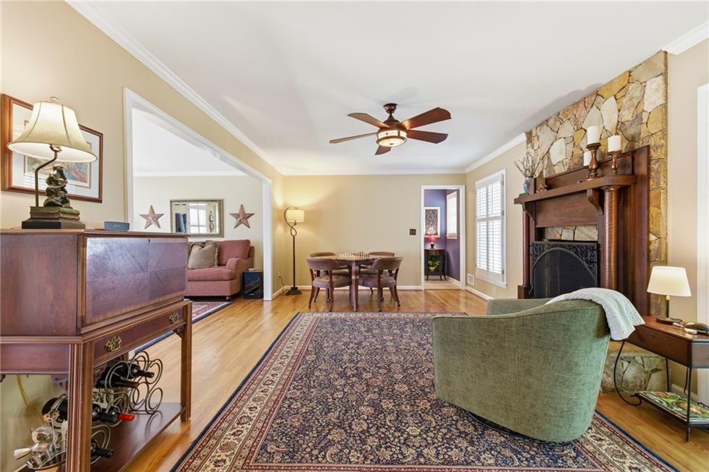 1924 Queens Way Atlanta, GA 30341 - Photo 25 of 88 a living room with furniture and a fireplace