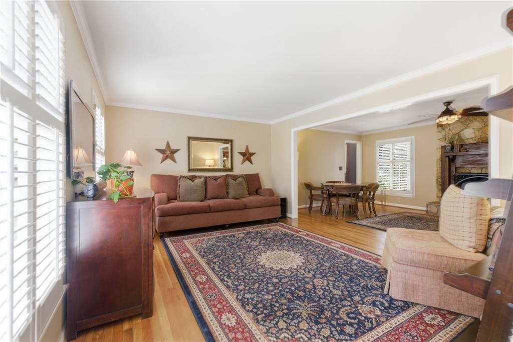 1924 Queens Way Atlanta, GA 30341 - Photo 28 of 88 a living room with furniture and a couch