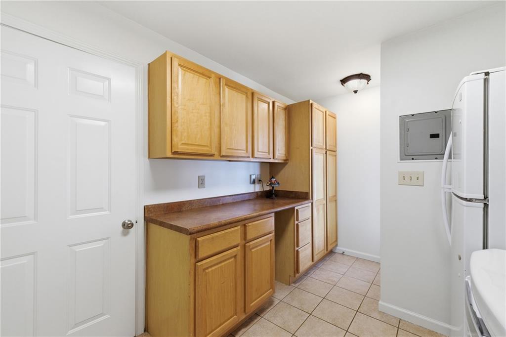 1924 Queens Way Atlanta, GA 30341 - Photo 33 of 88 a kitchen with stainless steel appliances granite countertop a refrigerator and a stove