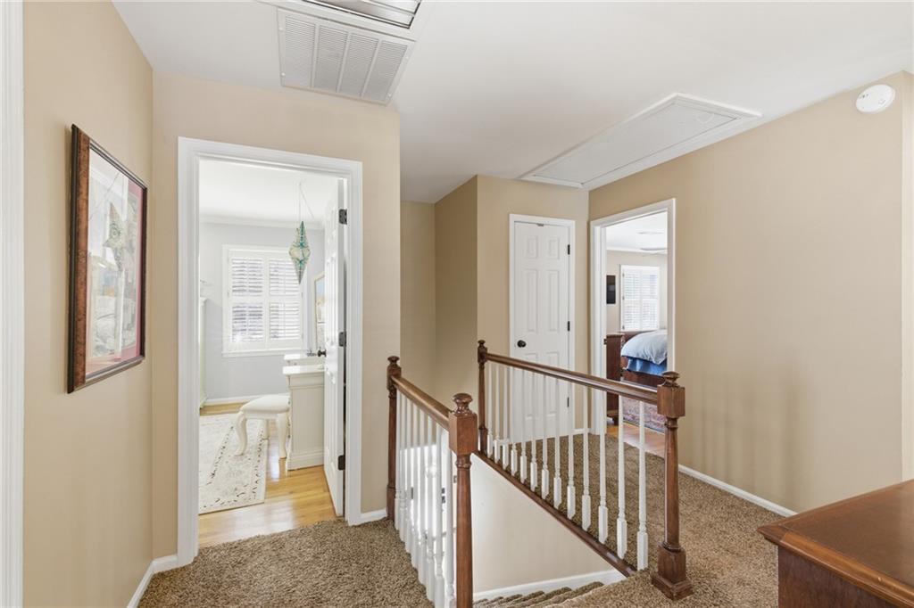 1924 Queens Way Atlanta, GA 30341 - Photo 45 of 88 a view of a hallway with a livingroom and a bathroom