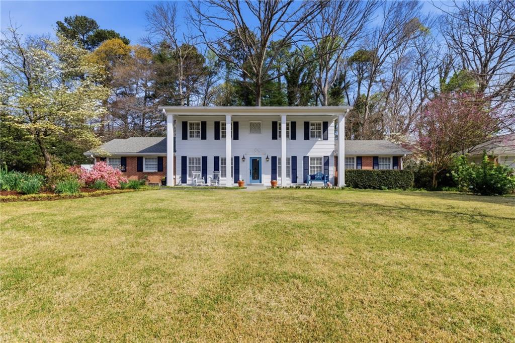 1924 Queens Way Atlanta, GA 30341 - Photo 80 of 88 a front view of a house with a garden