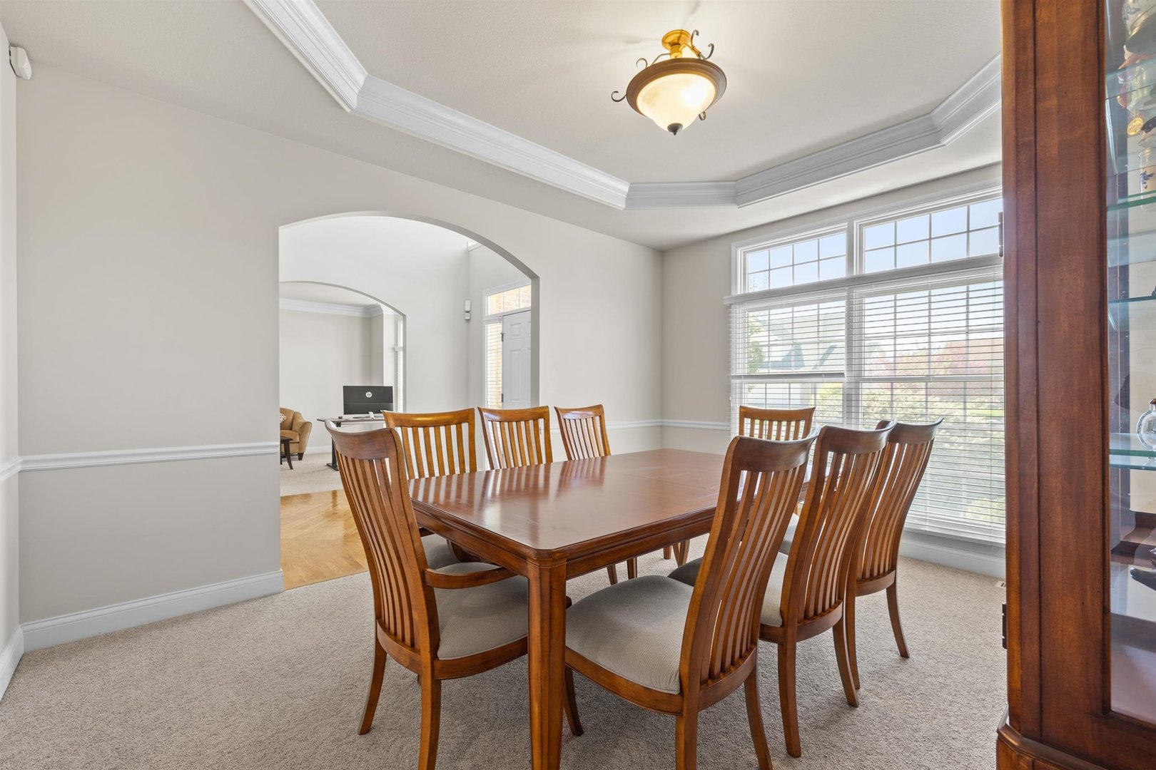 4512 Doverbrook Drive Champaign, IL 61822 - Photo 22 of 62 a view of a dining room with furniture window and wooden floor