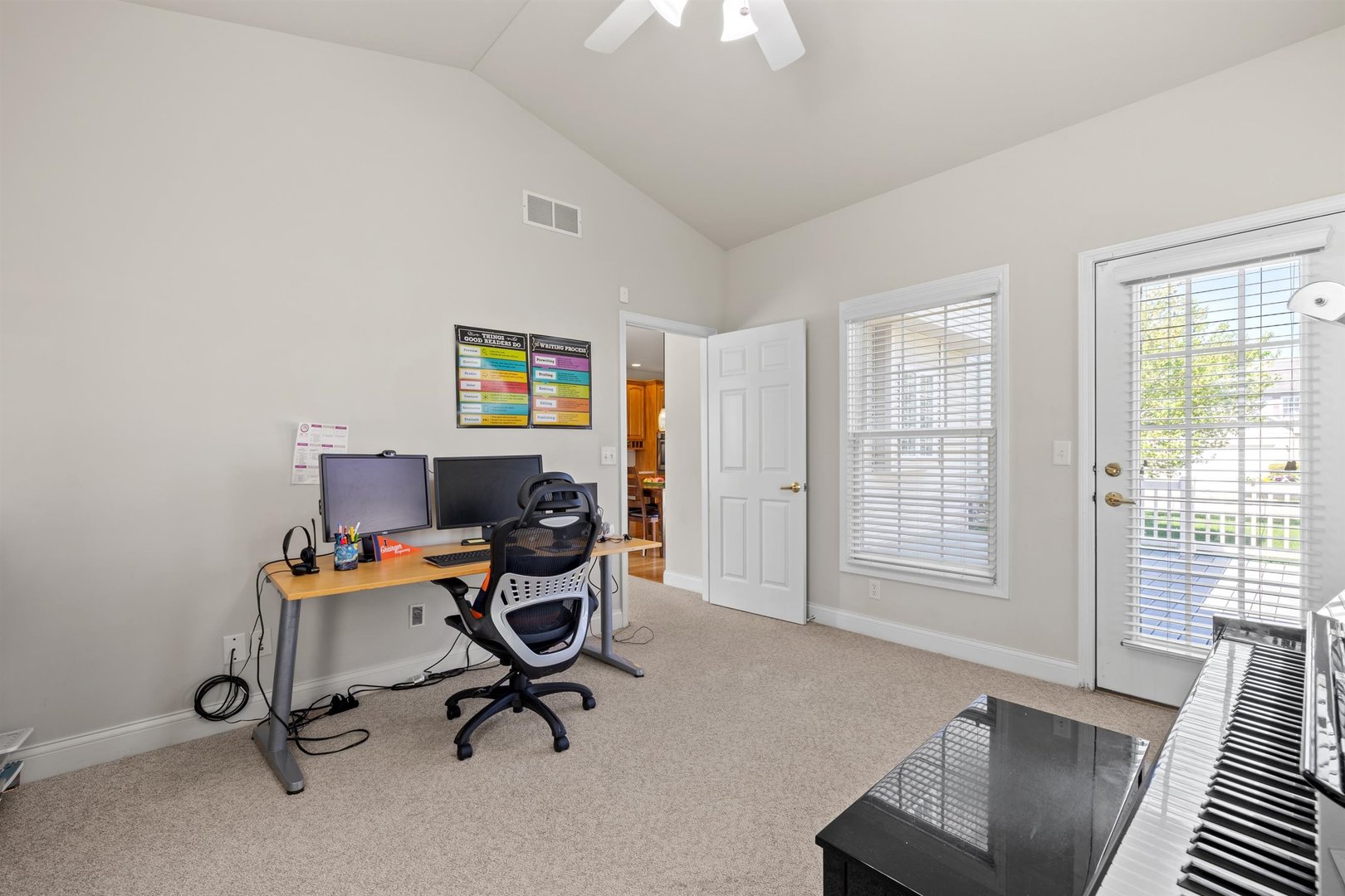 4512 Doverbrook Drive Champaign, IL 61822 - Photo 26 of 62 a view of a workspace with furniture and a window