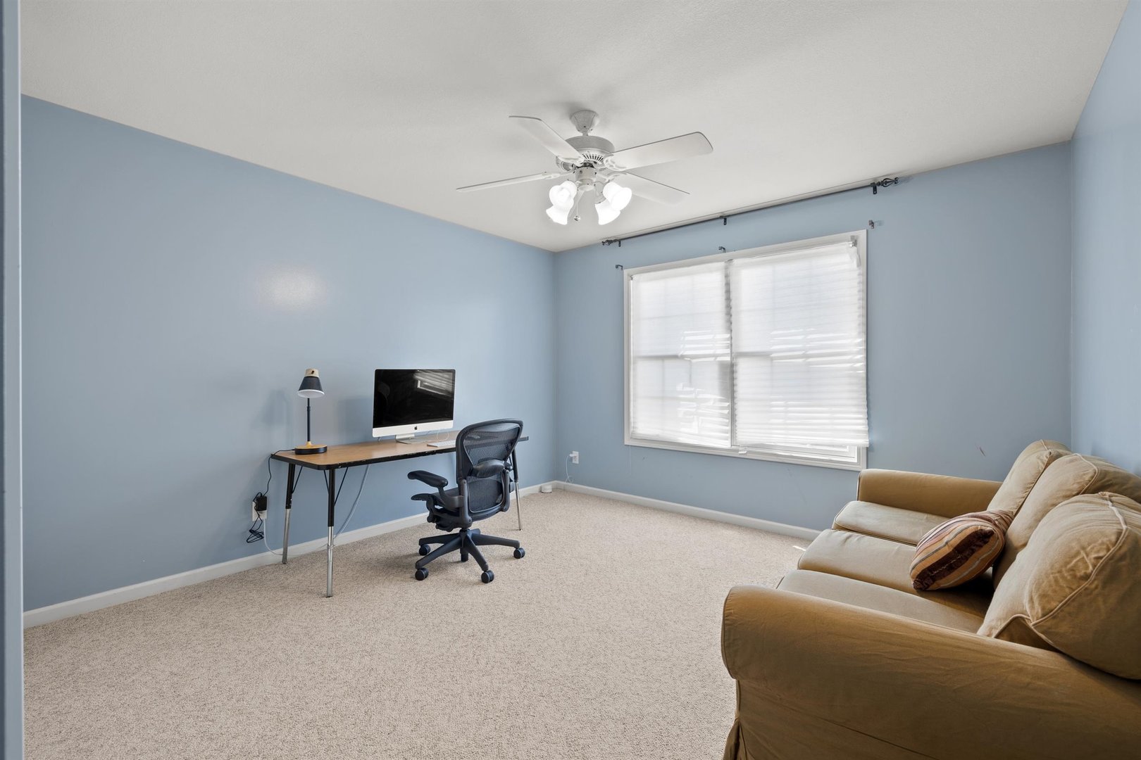 4512 Doverbrook Drive Champaign, IL 61822 - Photo 29 of 62 a living room with furniture and a window