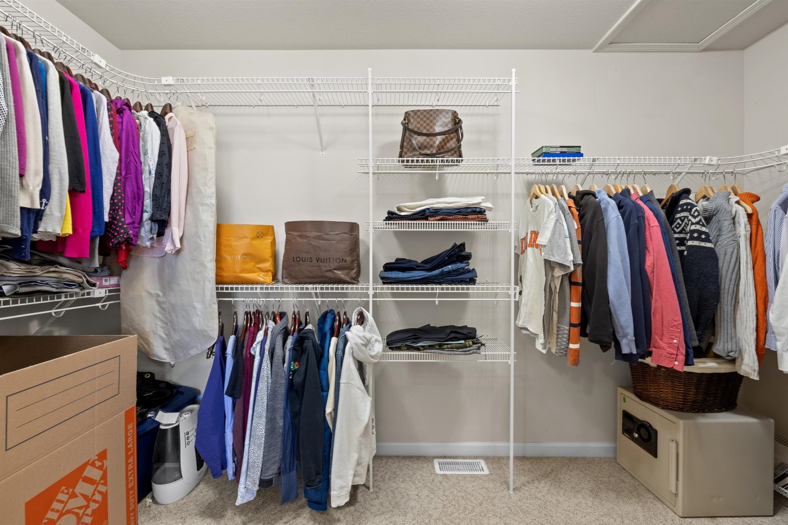 4512 Doverbrook Drive Champaign, IL 61822 - Photo 44 of 62 a view of walk in closet with clothes