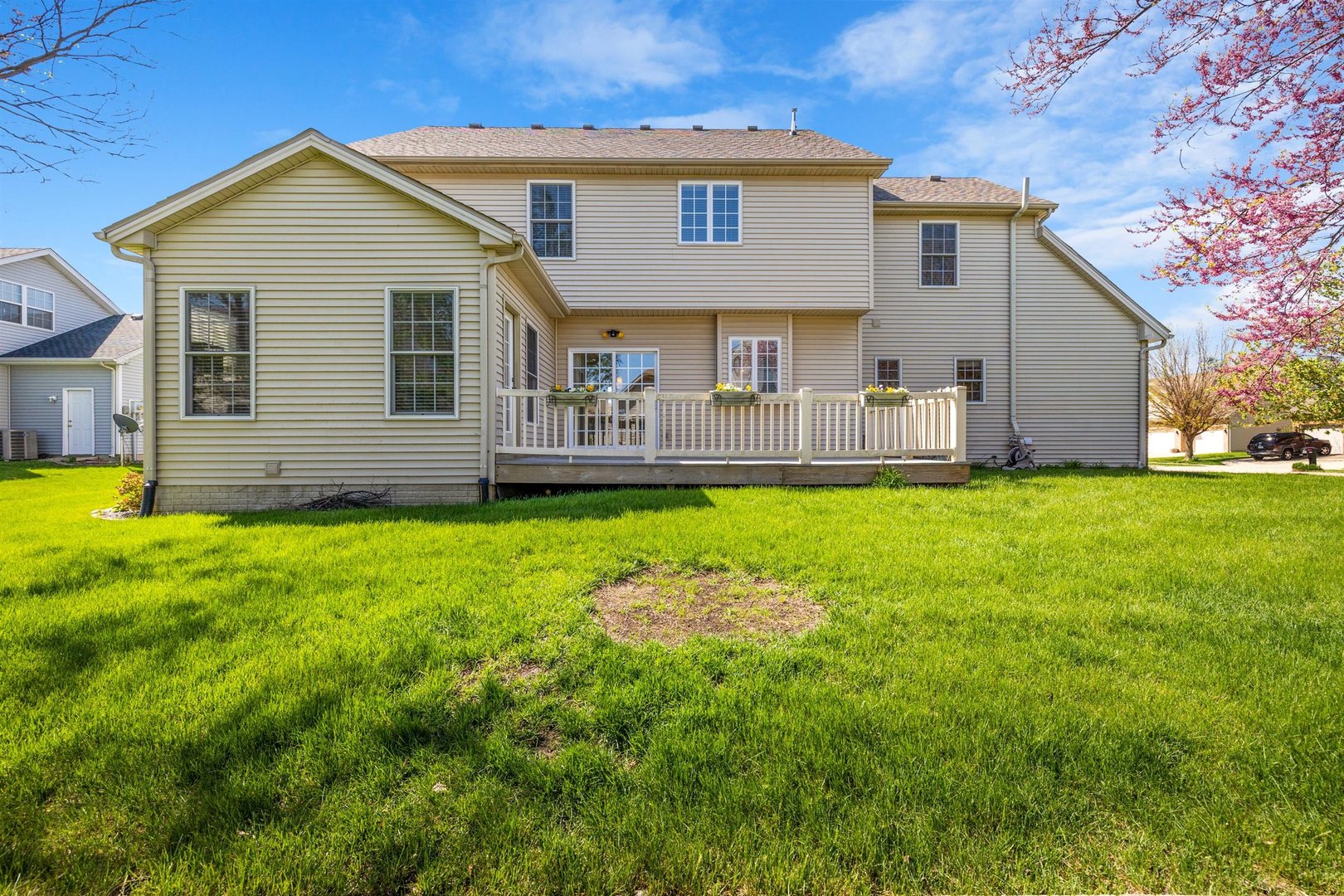 4512 Doverbrook Drive Champaign, IL 61822 - Photo 56 of 62 a front view of a house with a yard and porch
