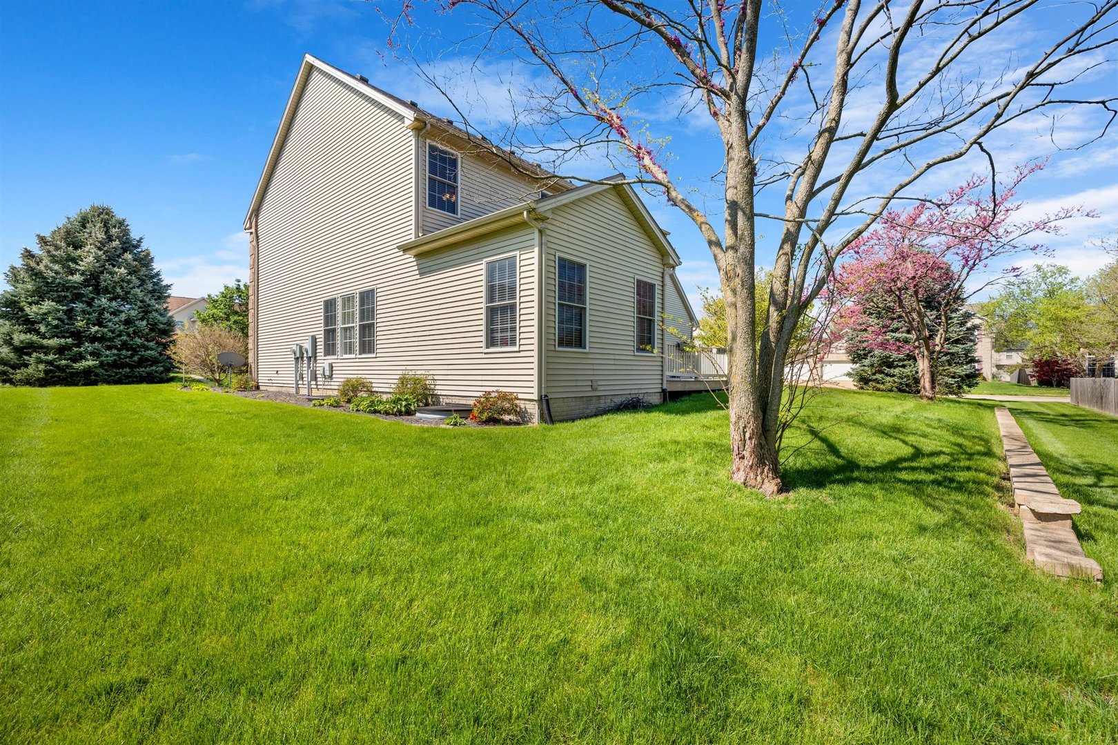 4512 Doverbrook Drive Champaign, IL 61822 - Photo 57 of 62 a view of a house with a yard