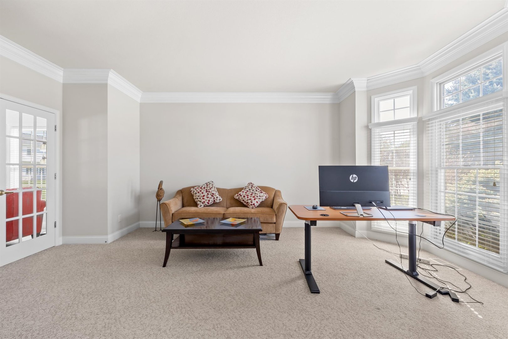 4512 Doverbrook Drive Champaign, IL 61822 - Photo 8 of 62 a view of a workspace with furniture and a window