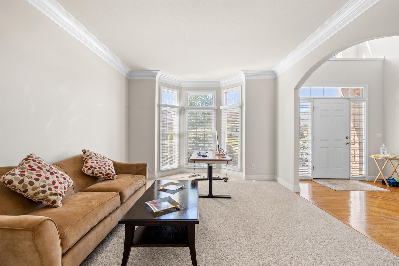 4512 Doverbrook Drive Champaign, IL 61822 - Photo 9 of 62 a living room with furniture and a large window with outer view