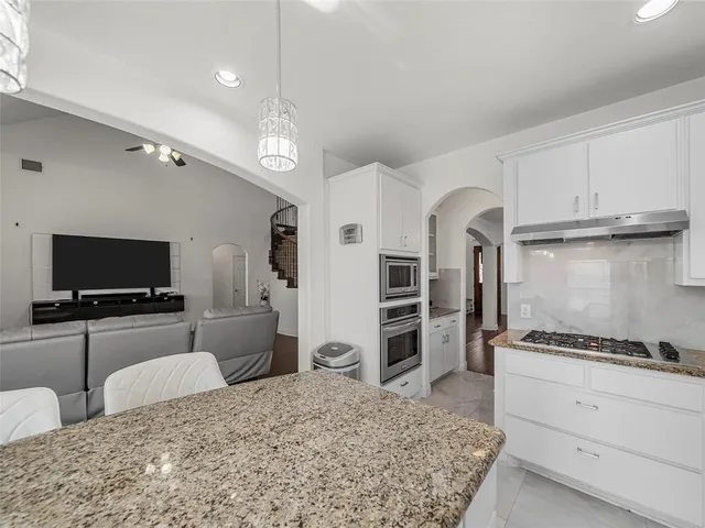 a bed room with a bed and a couch