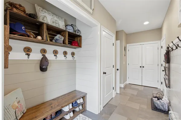 a bathroom with a tub shower and a sink