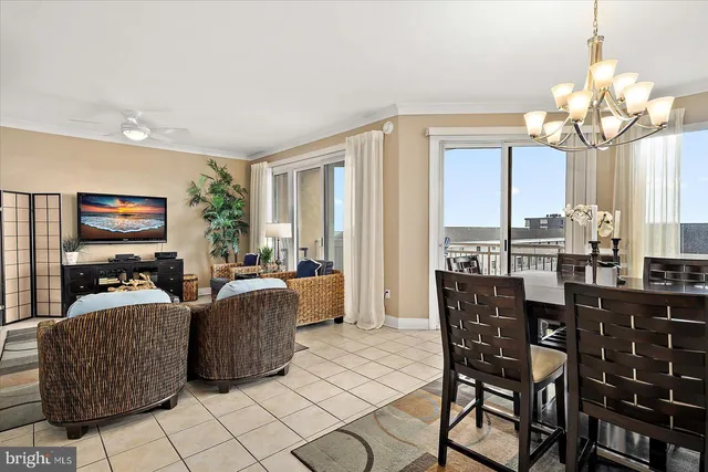 a balcony with table and chairs