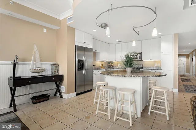 a white bath tub sitting in a bathroom