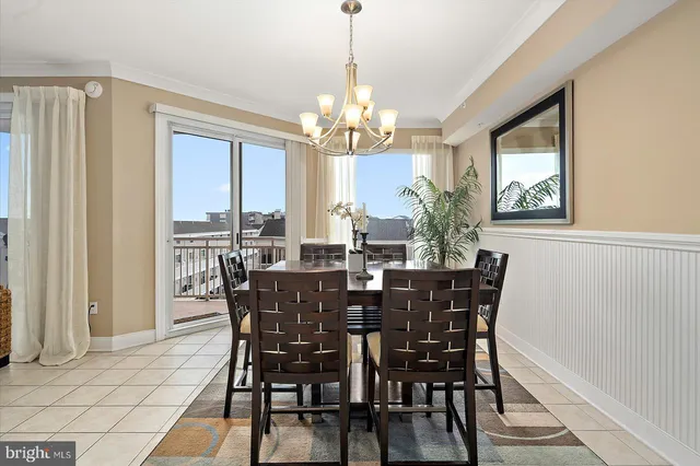 a living room with a flat screen tv and a fireplace