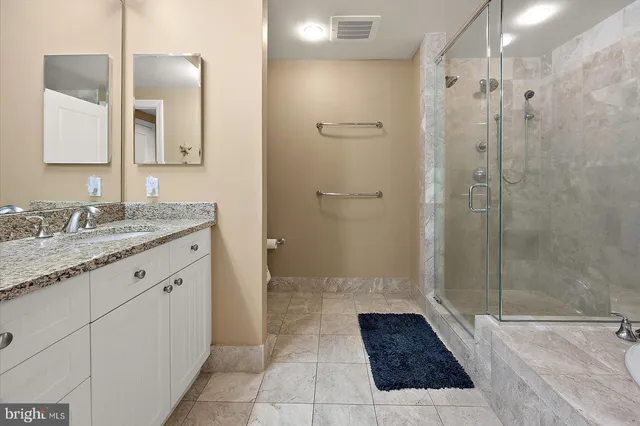 a view of a swimming pool and lounge chair