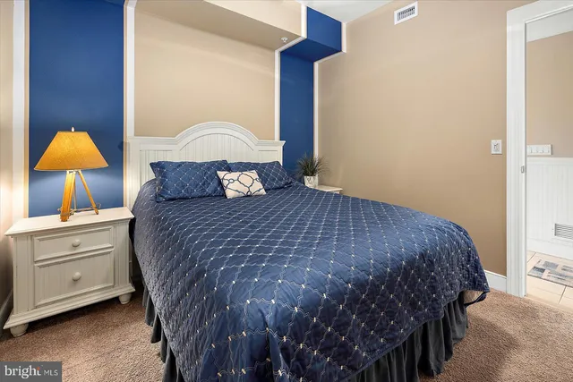 a view of a lake with couches