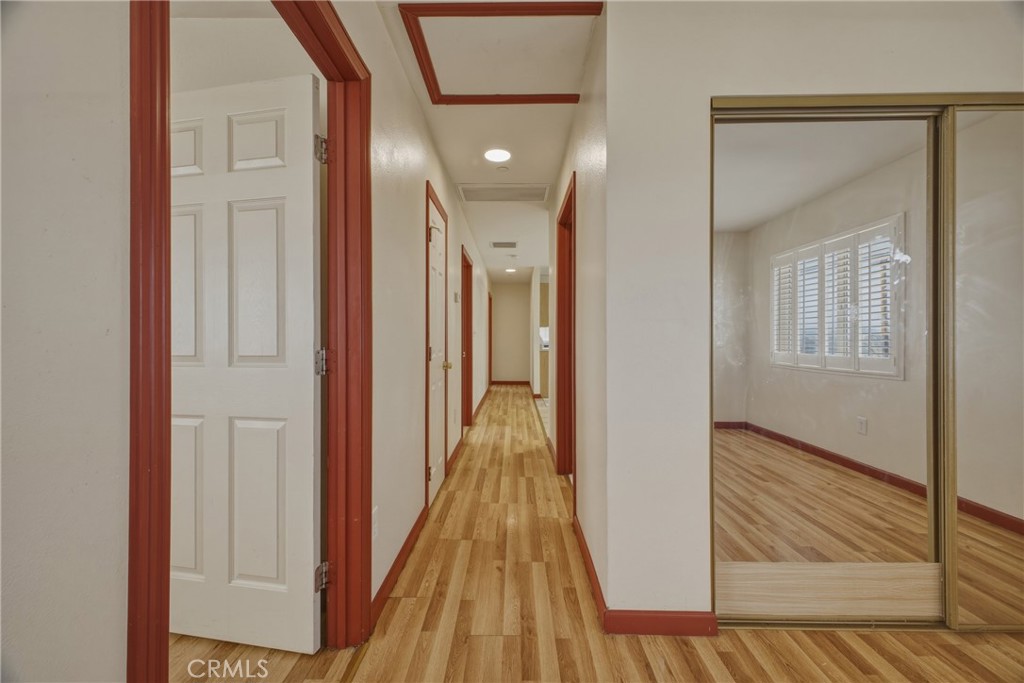 13407 Kagel Canyon Road Sylmar, CA 91342 - Photo 13 of 31 a view of hallway with wooden floor