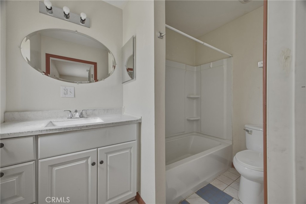 13407 Kagel Canyon Road Sylmar, CA 91342 - Photo 15 of 31 a bathroom with a sink a toilet and bathtub