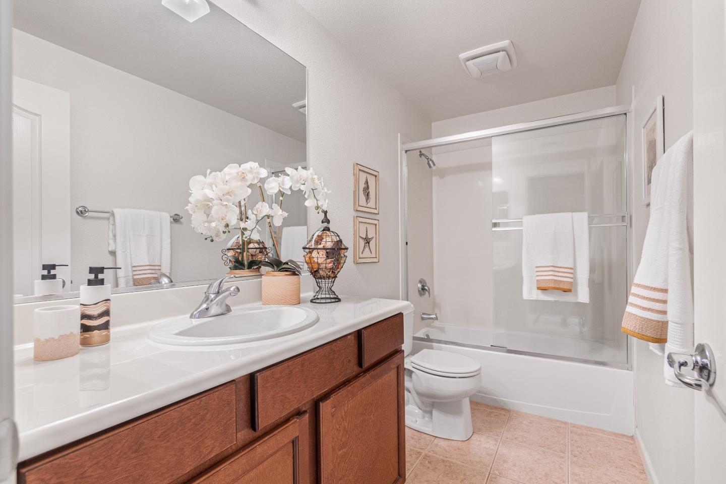 2197 Beech Circle San Jose, CA 95131 - Photo 11 of 32 a bathroom with a sink a toilet and shower