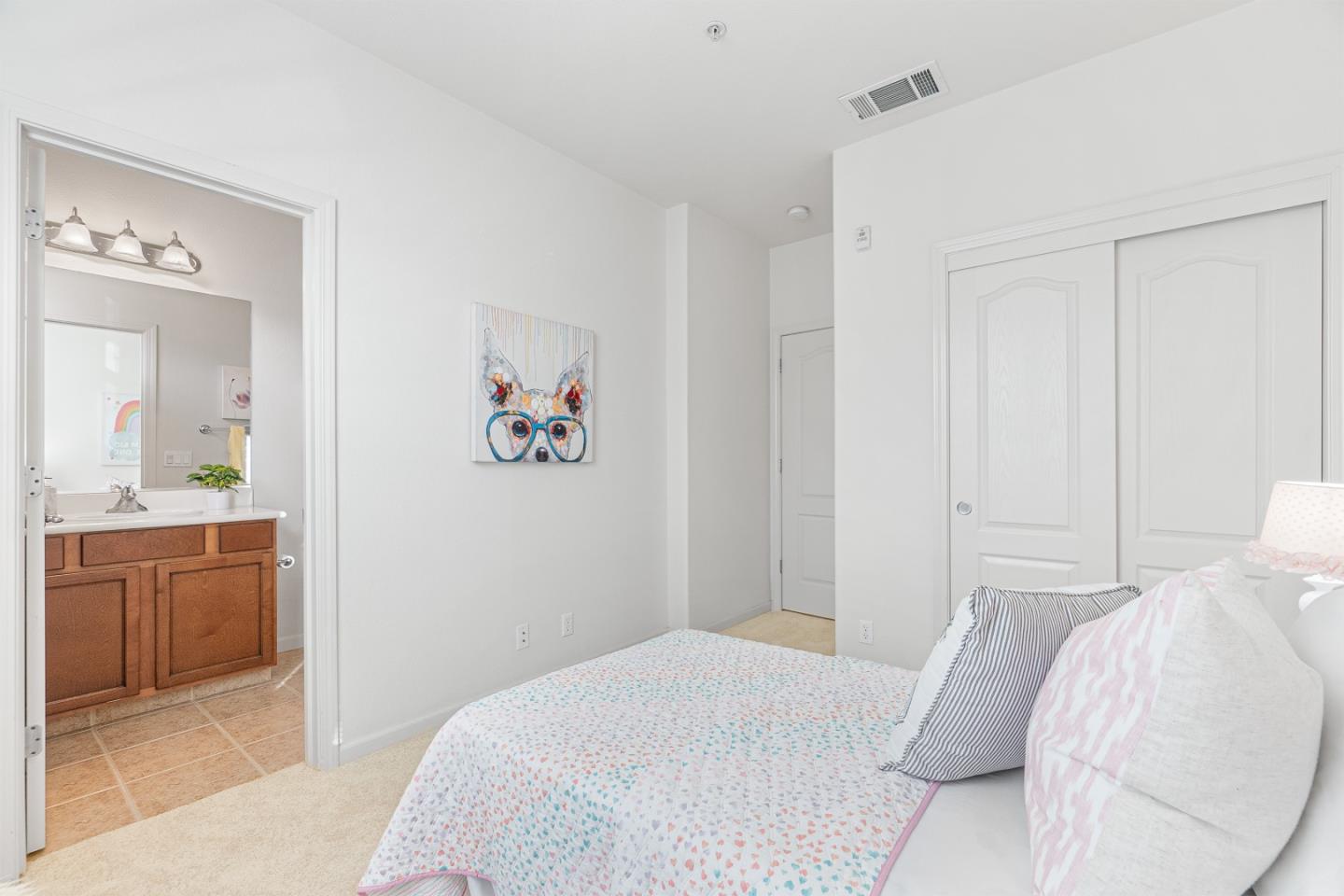 2197 Beech Circle San Jose, CA 95131 - Photo 16 of 32 a bedroom with a bed and a sink