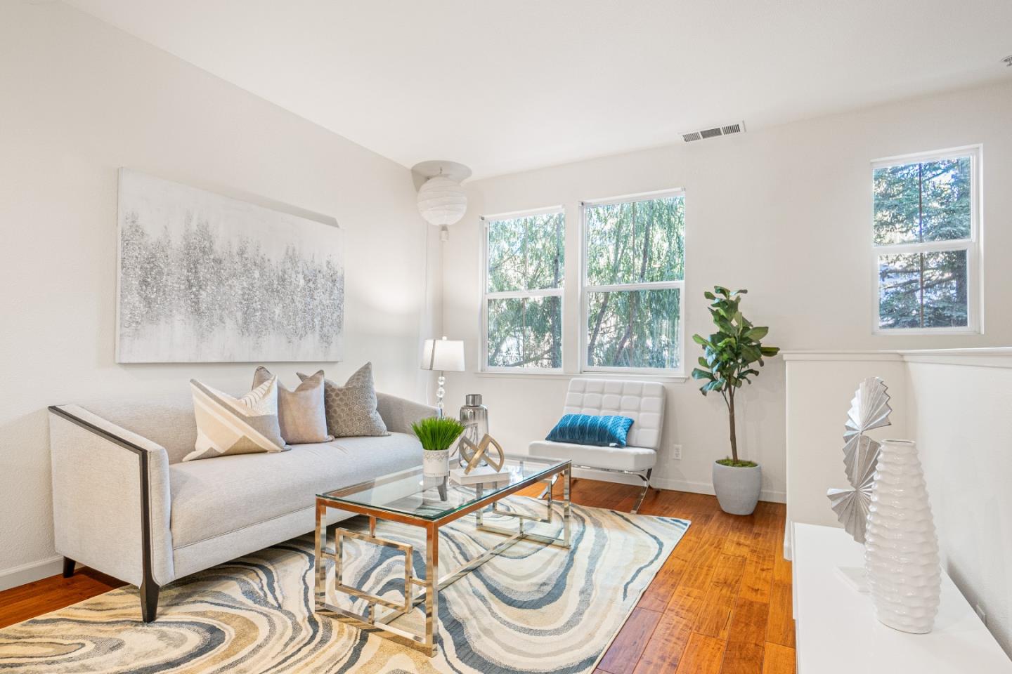 2197 Beech Circle San Jose, CA 95131 - Photo 2 of 32 a living room with furniture and a large window