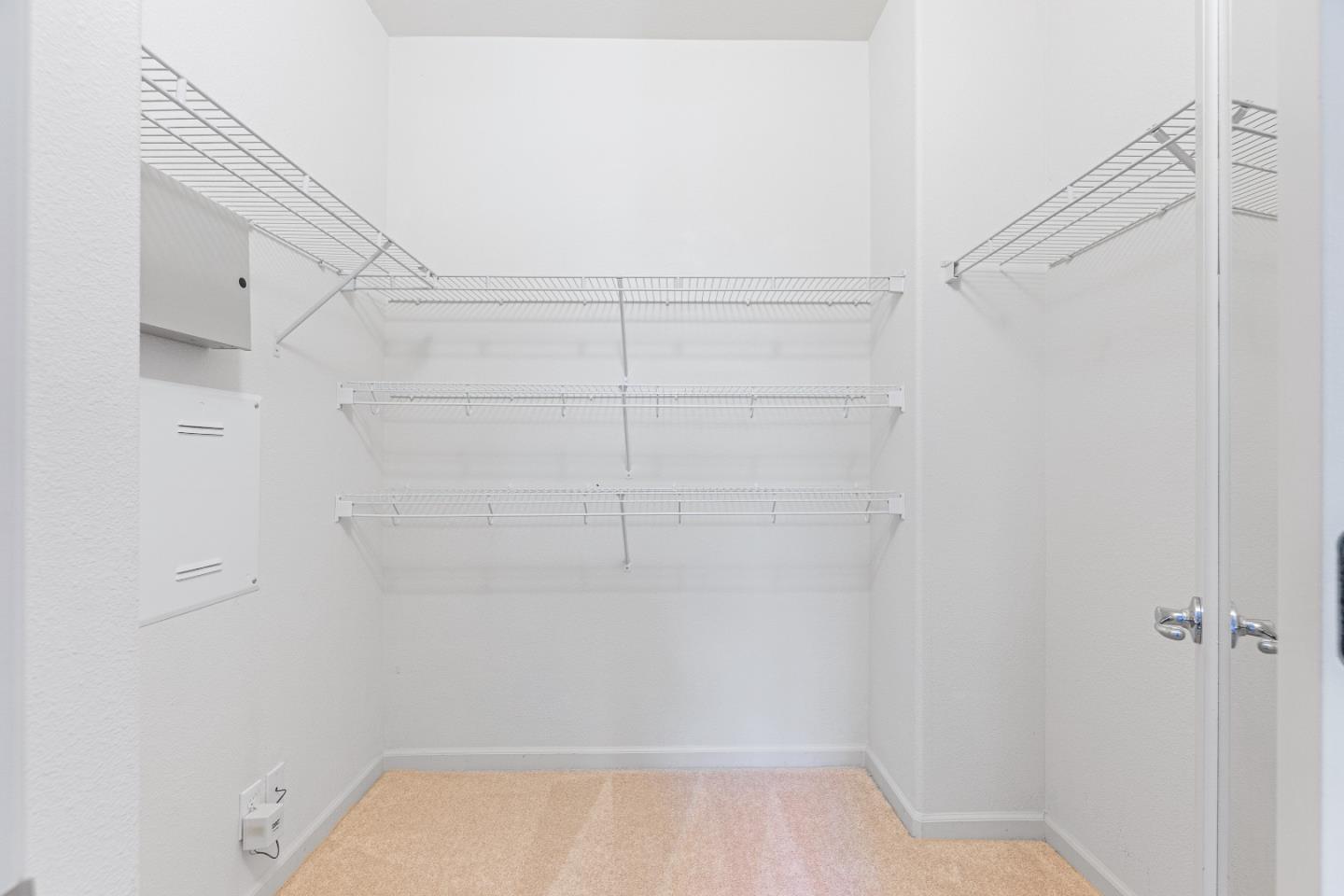 2197 Beech Circle San Jose, CA 95131 - Photo 24 of 32 a view of a room with racks on the wall