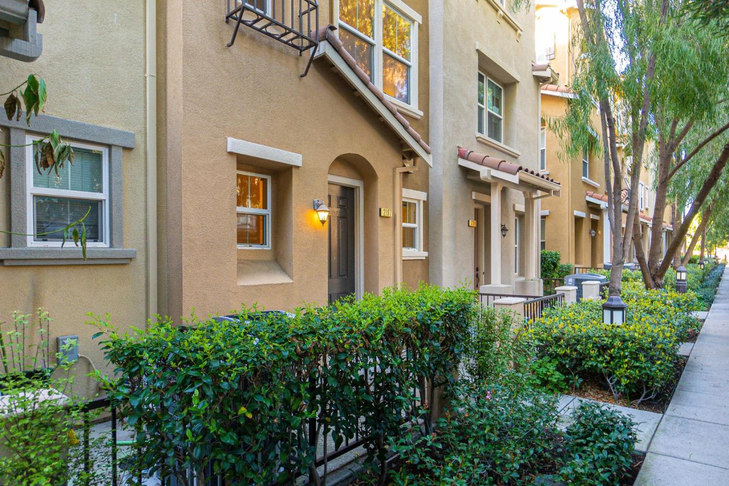 2197 Beech Circle San Jose, CA 95131 - Photo 28 of 32 a view of a brick building next to a yard