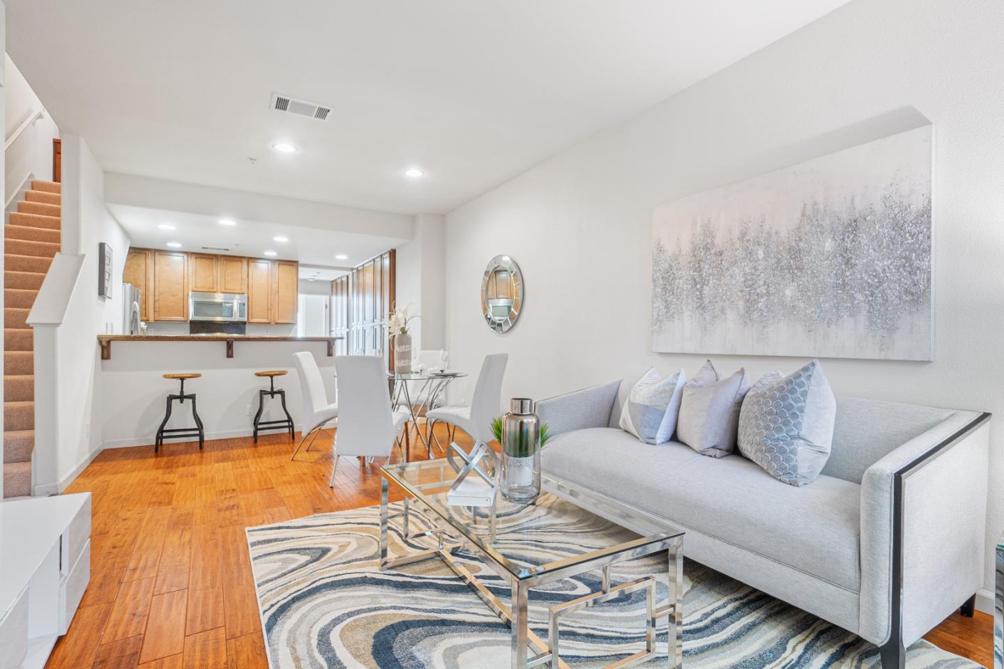 2197 Beech Circle San Jose, CA 95131 - Photo 4 of 32 a living room with furniture and a wooden floor