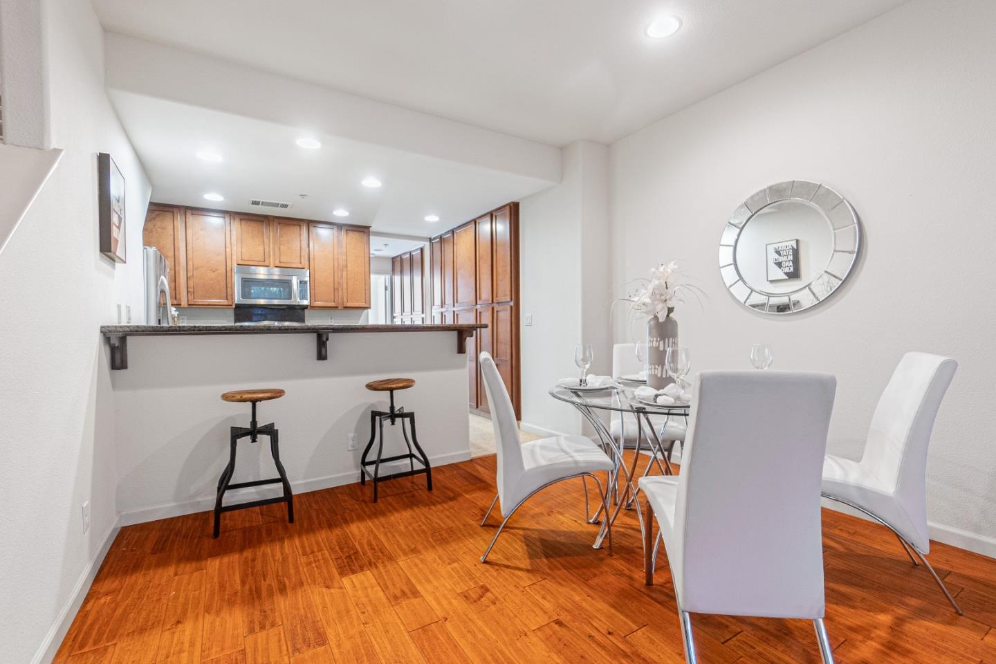 2197 Beech Circle San Jose, CA 95131 - Photo 5 of 32 a view of a dining room with furniture and wooden floor