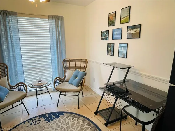 a living room with a couch and a table