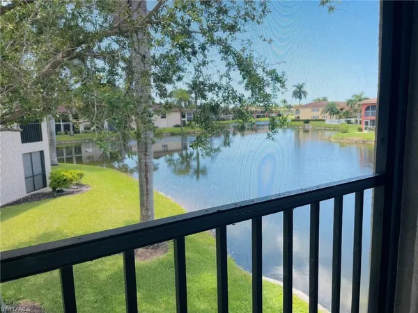 a view of a lake from a balcony