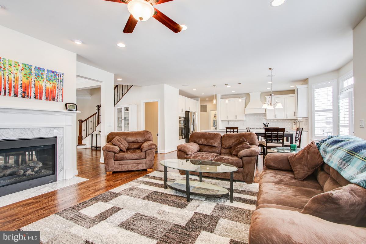 8391 Edward Carr Court Springfield, VA 22153 - Photo 11 of 67 Large open family room with gas fireplace